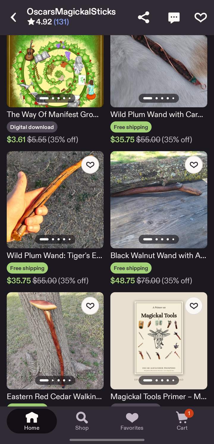 Phone screenshot of the OscarsMagickalSticks Etsy shop: a grid of listings including a wild plum wand, a black walnut wand, an eastern red cedar walking staff and two free-book editions.